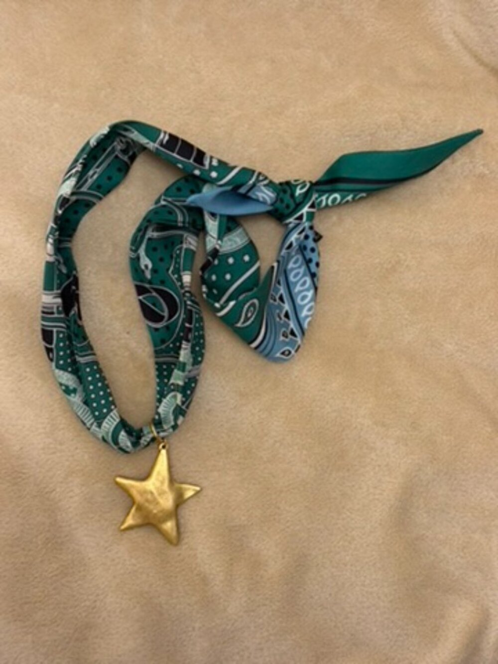 Silk scarf with pendant necklace